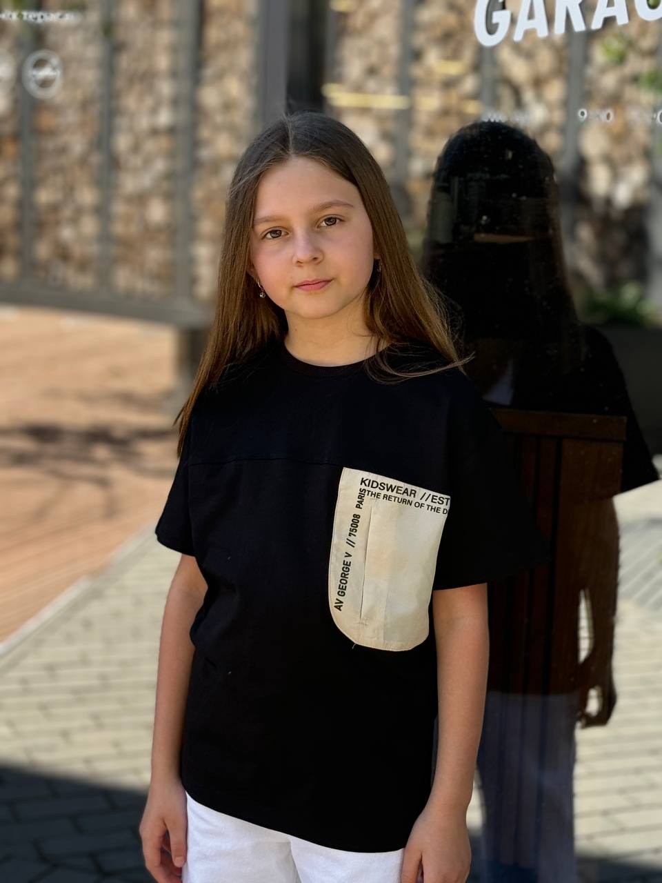 T-shirt per bambini Lublu "Il ritorno di" Nera