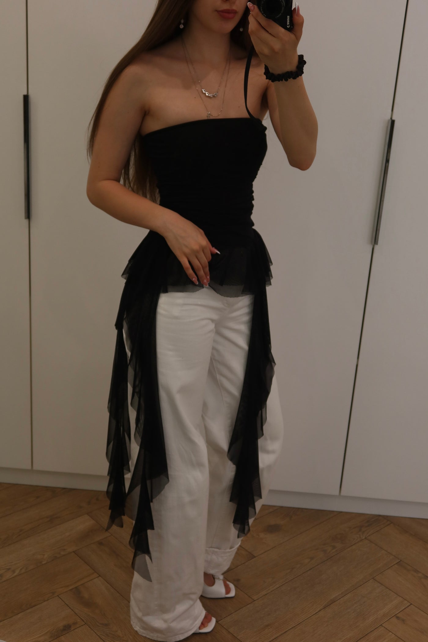 Black ruffled top