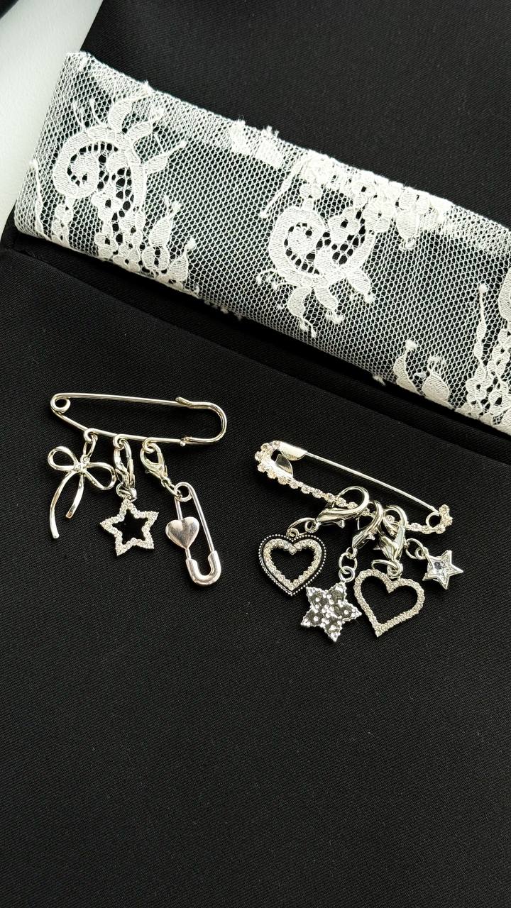 Pin with chains