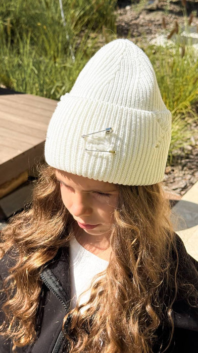 Torn cap in assortment