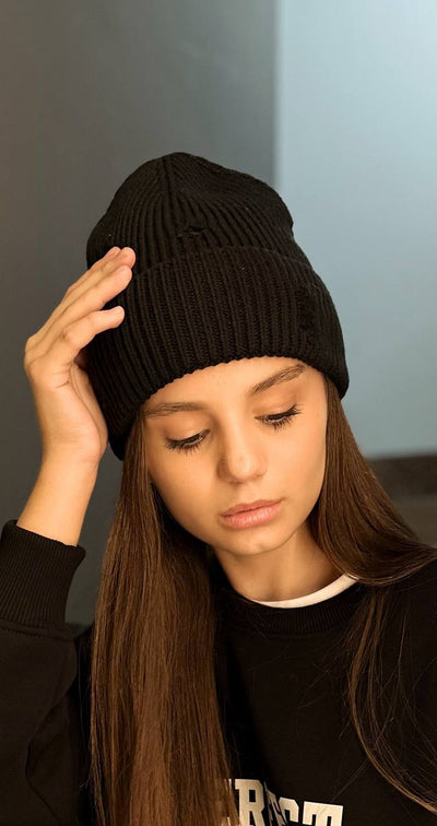 Torn cap in assortment