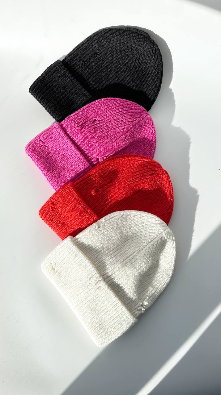 Torn cap in assortment