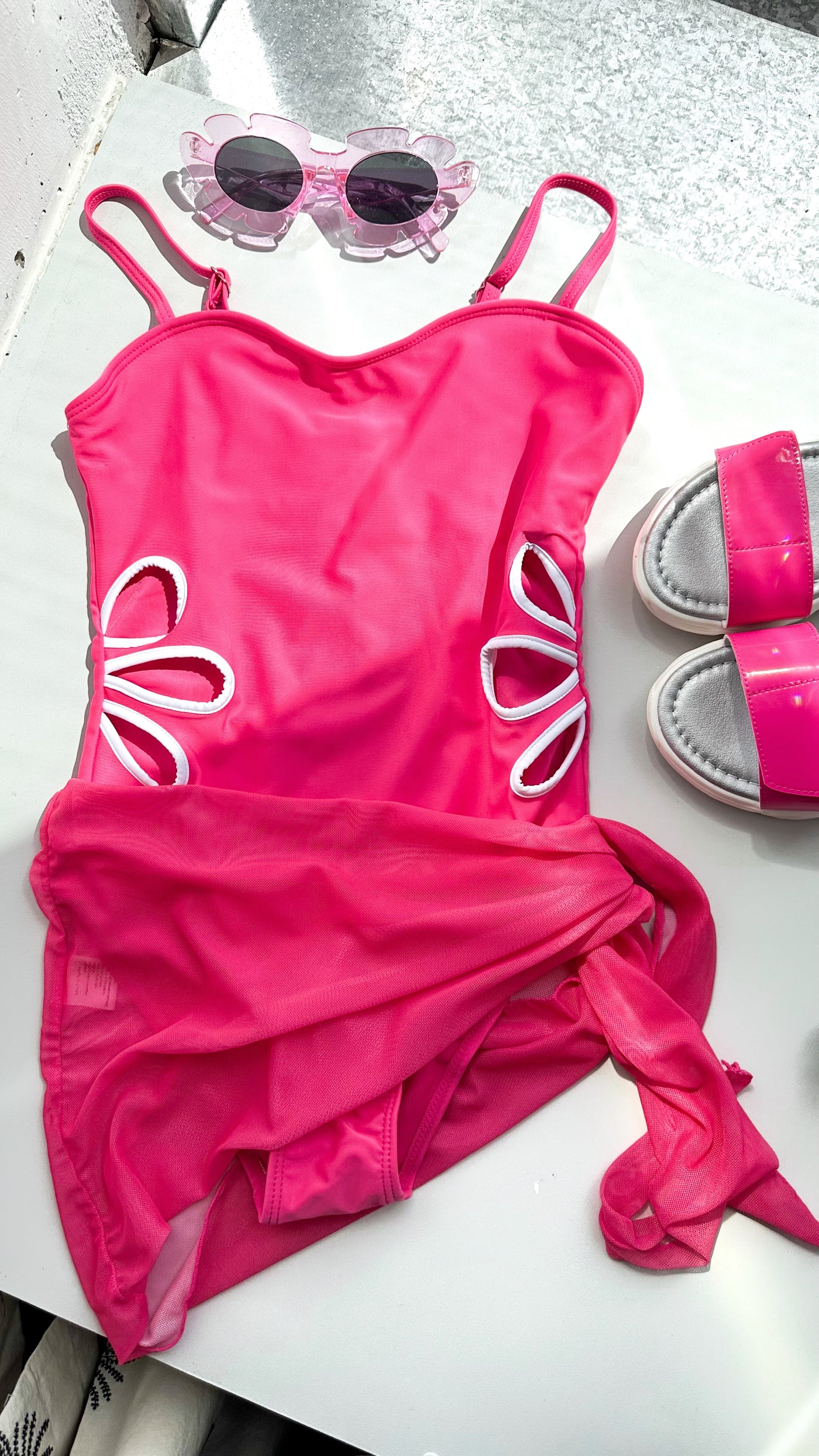 Pink swimsuit with pareo