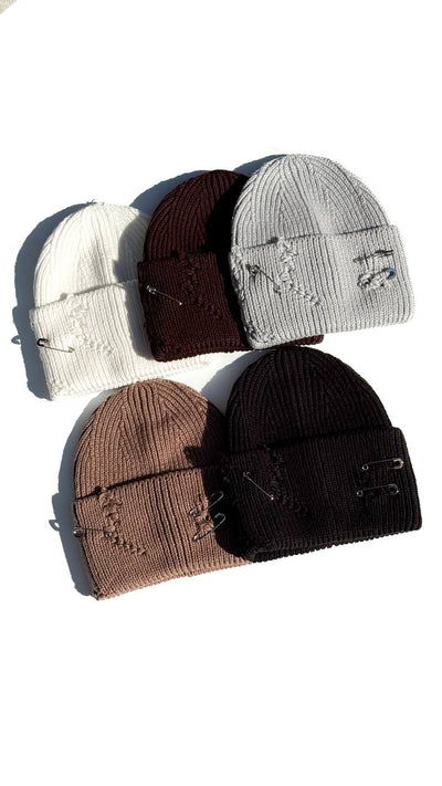 Torn cap in assortment