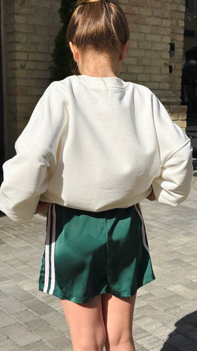 Green satin shorts